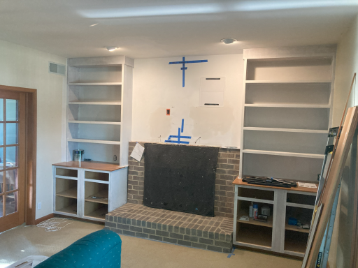 Cabinets and wall primed Cabinetry in process
